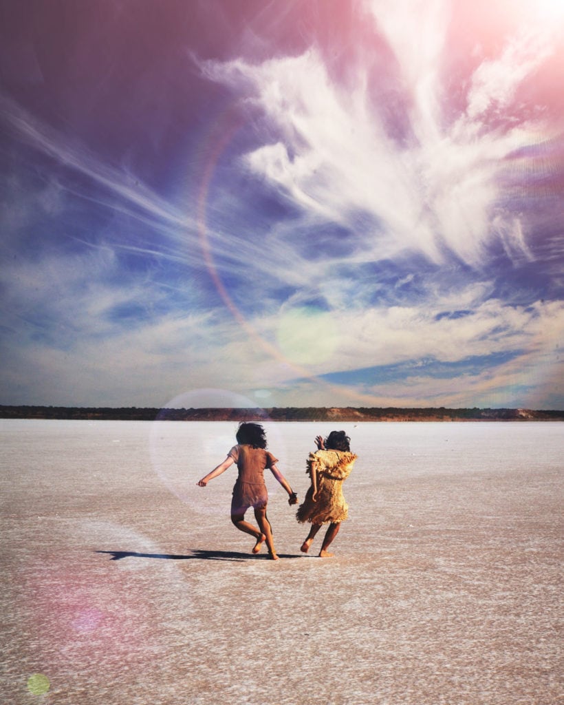 MonaLisa Twins running on a huge salt lake in Australia