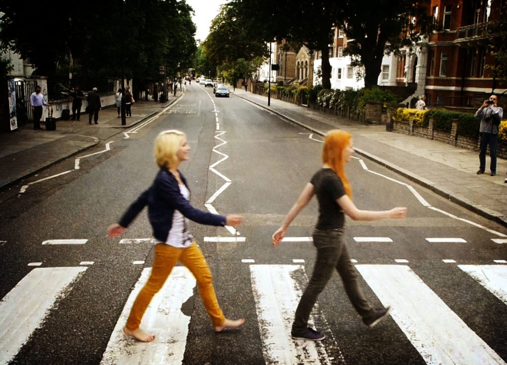 MonaLisa Twins crossing Abbey Road like on the Beatles album cover