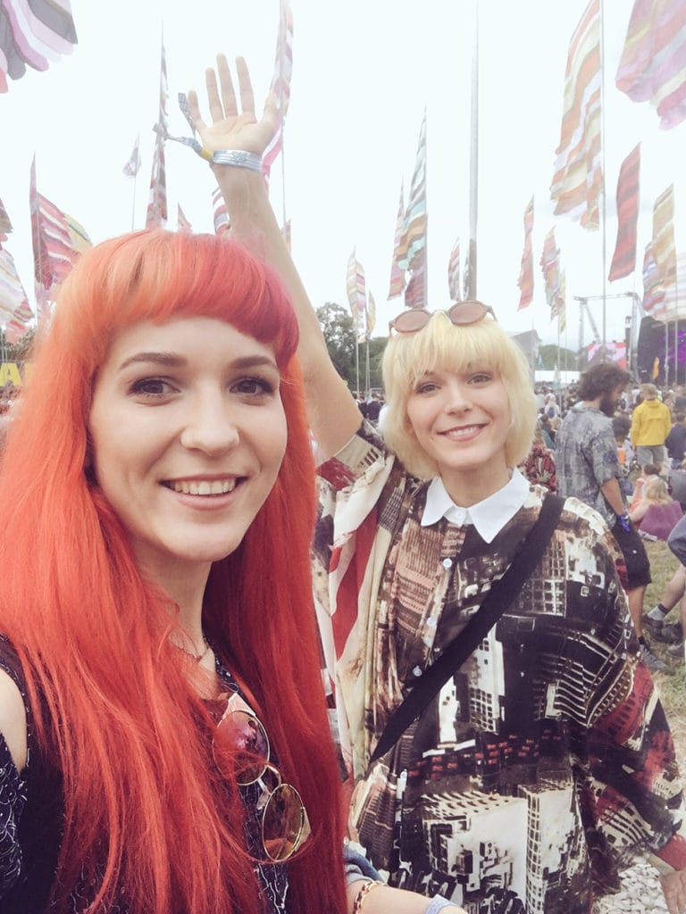 The MonaLisa Twins at Glastonbury festival strolling around before their show