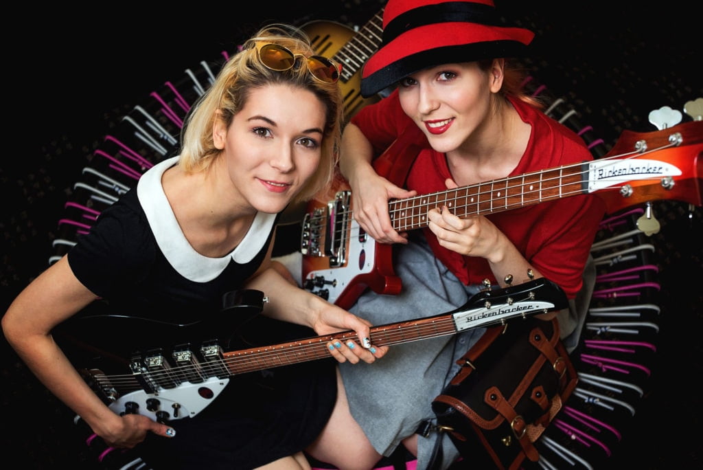 MonaLisa Twins with new Rickenbacker instruments - black bass and cherry-red guitar