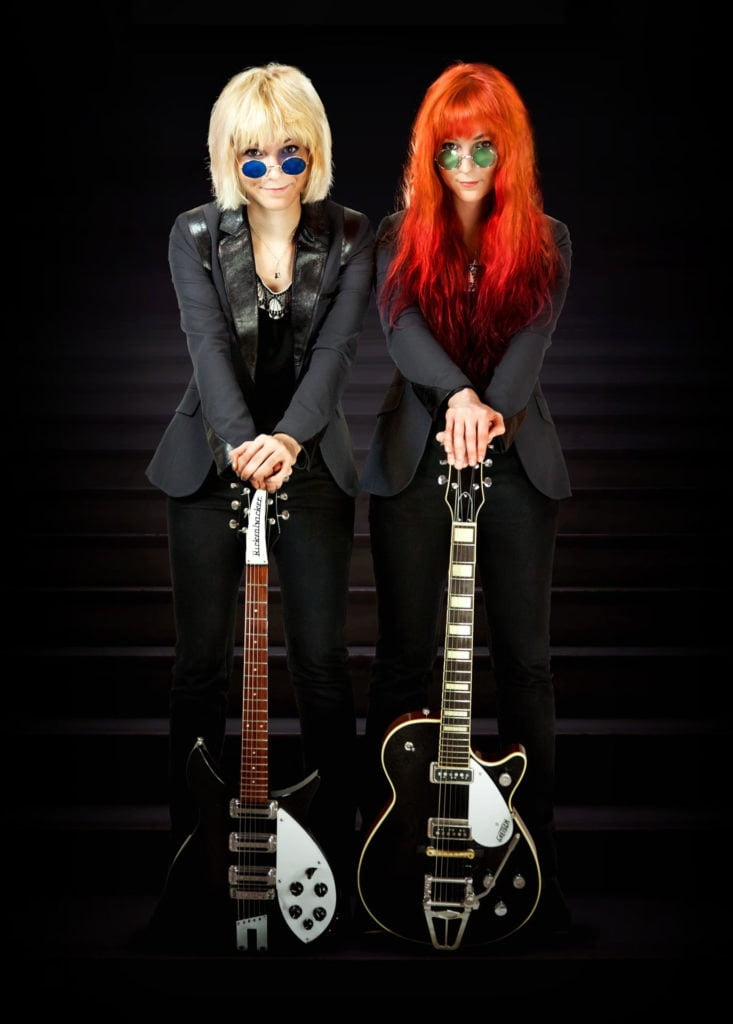 MonaLisa Twins featuring their Rickenbacker and Gretsch guitars on one of their band photos
