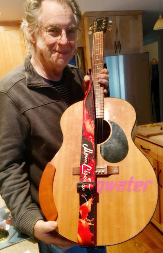 John Sebastian wearing the MLT guitar strap